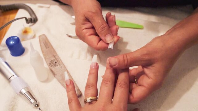 Video on how to apply artificial nails