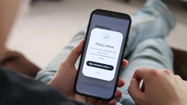Modern consumer activating a digital insurance policy at home via mobile app. Seamless UI showing Get insured now to Policy active confirmation. High-quality footage for fintech, health, or travel