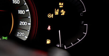 Fototapeta premium Car dashboard. Modern digital car dashboard with illuminated speedometer warning icons fuel gauge driver assistance and other indicators. Advanced automotive instrument cluster tech in future vehicle
