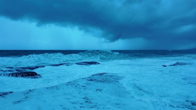 Extreme Ground-Level Shot from Rock Surface &ndash; Giant Waves Crashing and Foaming All Around During Tsunami Storm Surge