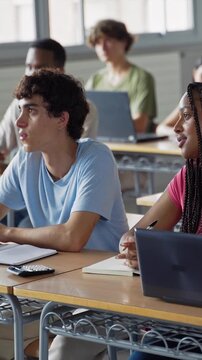 Teenager Students focused listening to professor motivational lecture, learning at High School