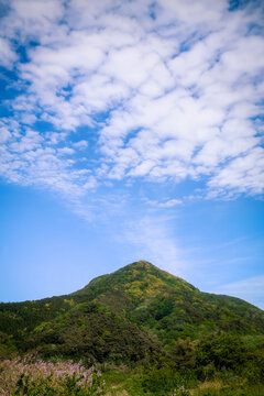Summer travel photo of Sobaek Mountains, with the summit at 4,721 ft, along the Honam Express Highway in Gyeongsangnam‑do, South Korea