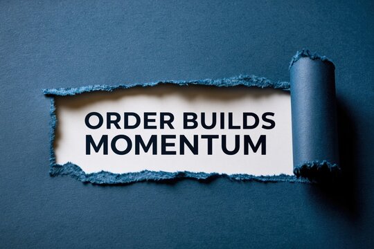 Order Builds Momentum concept shown under a blue paper tear