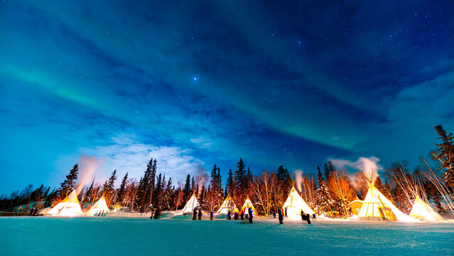 Aurora Glow Through Clouds Over Yellowknife