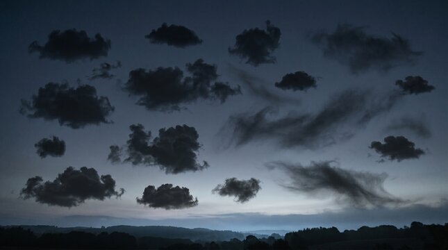 Dark sky filled with scattered clouds at twilight many clouds cloud formations