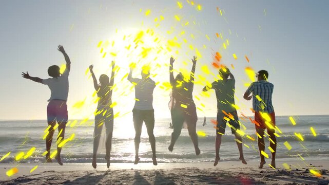 Six friends bending, starting yellow particles, then jumping on sunlit shore for lifestyle