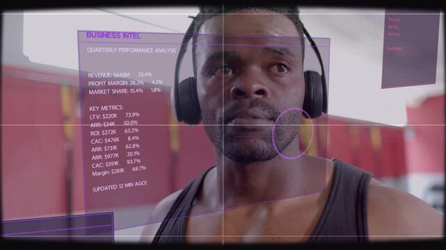 Man placing headphones and activating AR panels with business intel metrics scanning for workout