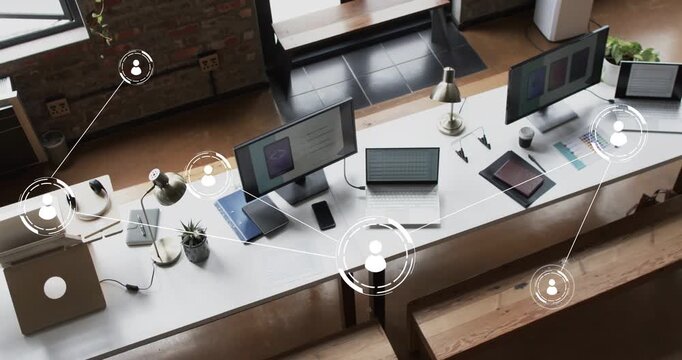 Single user icon appearing over shared desk starting network, linking devices and showing teamwork