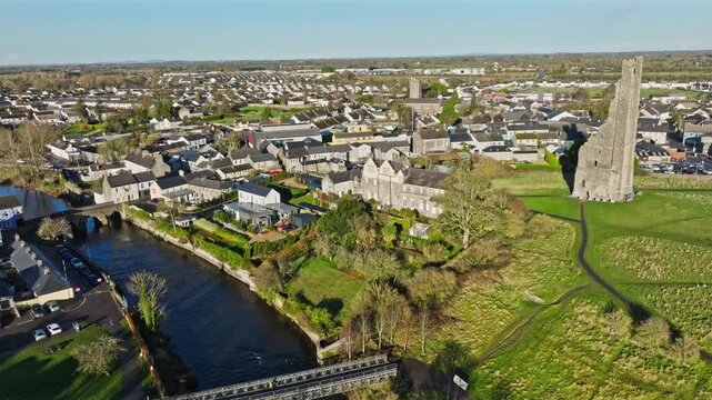 Panoramic aerial view of Trim old city and the winding River Boyne through lush countryside.