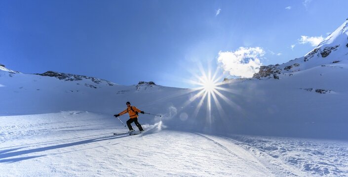 Skier with touring skis skiing in the snow, Ski tour Geierspitze, Wattentaler Lizum, Tuxer Alps, Tyrol, Austria