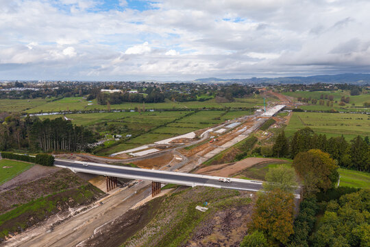 The earthworks for a new highway passing under an existing road bridge. Takatimu North Link Project, Bay of Plenty, New Zealand