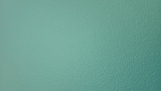 Abstract turquoise textured wall background with soft gradient and copy space
Minimal abstract turquoise background with subtle wall texture and smooth gradient lighting. Clean pastel surface with cop