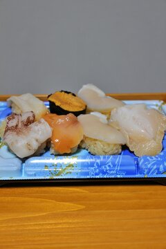 Assorted shellfish nigirizushi purchased at a supermarket in Tokyo, Japan