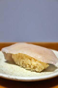 Albacore Edomae nigirizushi made with red vinegar purchased at a supermarket in Tokyo, Japan