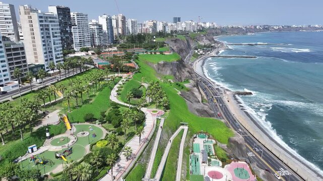 Miraflores Skyline In Lima Metropolitan Region Peru. Aerial View Of Green Space Surrounded By Lush Forest Trees. Shore Sky Clouds Beach Sea. Seaside Panoramic. Lima Metropolitan Region.