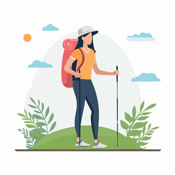 Woman hiker with backpack and trekking poles in nature