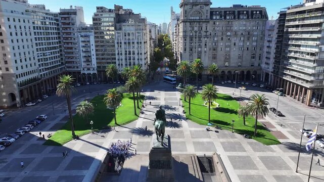 Independency Square In Montevideo Maldonado Uruguay. Aerial View Of A City Park Surrounded By Busy Streets And Buildings. Business Clouds Sky Downtown Cityscape. Backgrounds Famous.