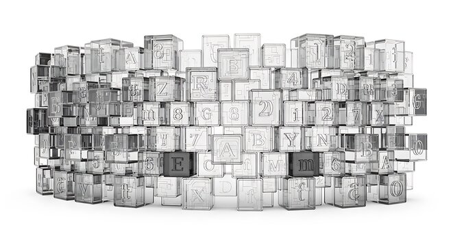 A stack of metallic and glass letterpress blocks with letters and symbols on a white background