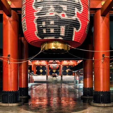 Large paper lantern hangs over the entrance to Senso-Ji Temple at night, Asakusa, Tokyo, Japan
