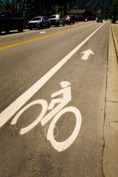 Bicycling path sign on a road surface, a dedicated cycle lane.