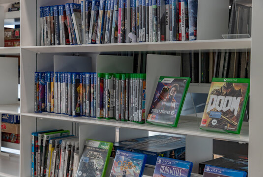 Helsinki, Finland - August 20, 2025: A picture of a collection of console games, namely from Playstation and Xbox.