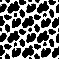 Fototapeta premium Blob seamless pattern spot print in bold black on white. Freeform stain and organic amoeba as modern vector for textile. Monochrome animal repeat with dalmatian and cow motif on fabric.