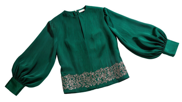 Isolated luxurious emerald green blouse with voluminous sleeves and ornate gold floral embroidery.