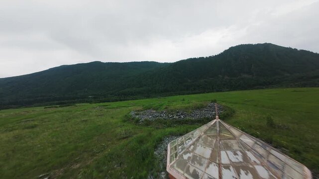 Unique FPV drone flight over an ancient Scythian burial mound in the famous Berel Valley of the Kings. Filmed in the Altai Mountains, East Kazakhstan. Footage showcases the archaeological heritage 