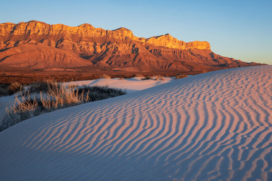 Guadalupe Mountains national park landscape, sand dunes and sunlit mountains