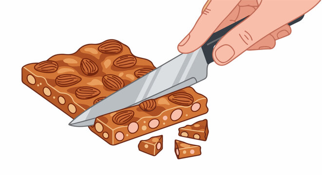 Hand slicing a nougat bar studded with almonds and pink nuts