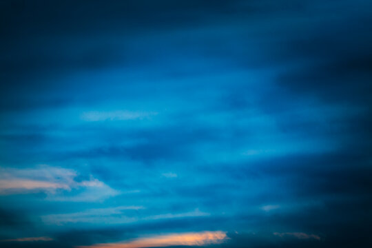 Defocussed dark clouds with sunlight clearing, Seattle, WA USA
