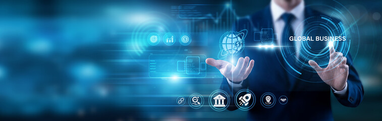 Director pointing at Global Business text. Coordinating commercial operations across different countries to expand market reach and navigate complex international economic and legal systems. © Theyone