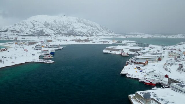 Snow-covered landscape of Sommaroya summer island in Norwegian arctic, aerial