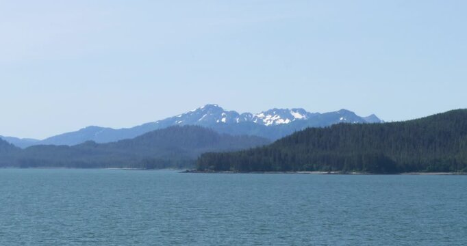 Beautiful snow-capped mountains around Juneau. Alaska in summertime.Sailing around Juneau.