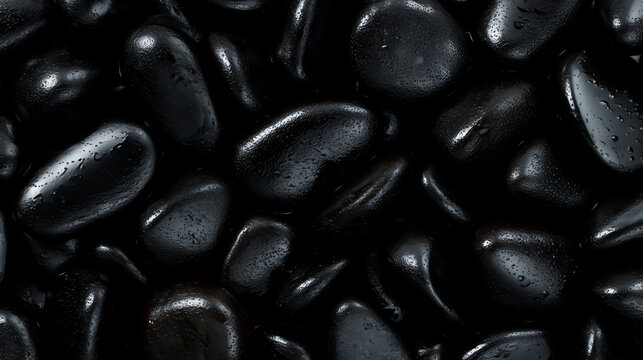 Macro shot of shiny black obsidian stones with textured surface