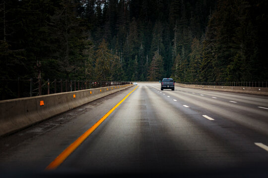 Interstate 90 near Snoqualmie Pass, a single vehicle on the road.