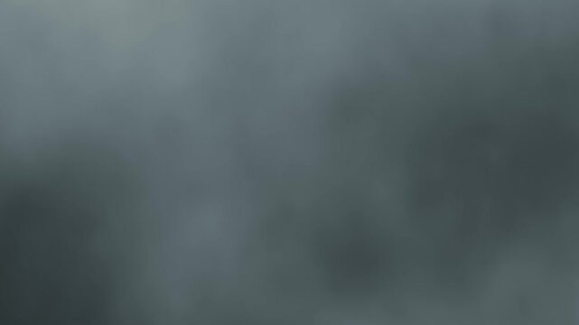 Fondo abstracto de nubes grises suaves en evoluci&oacute;n 4K para motion graphics y atm&oacute;sfera cinematogr&aacute;fica
