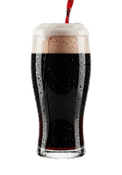 a perfectly poured imperial pint of dark stout beer with crimson hints, thick creamy white foam, and condensation on the chilled glass, on a reflective white surface. premium beverage advertising