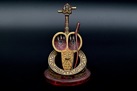 Decorative cultural souvenir from Central Asia representing the ancient Kazakh kobyz instrument for gift or collection