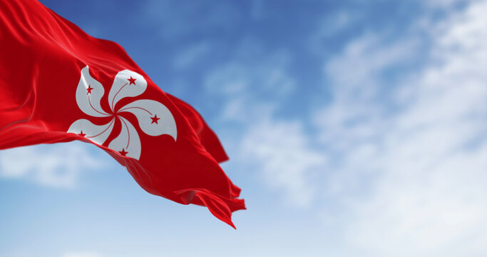 Hong Kong flag waving in the wind on a clear day