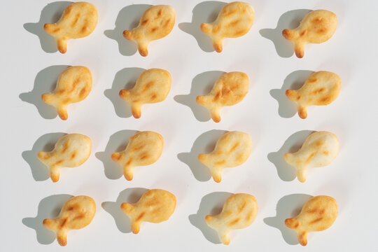 fish-shaped cookies on a white table