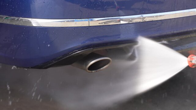 Pressure Washing Car Exhaust Pipe at Self Service Car Wash