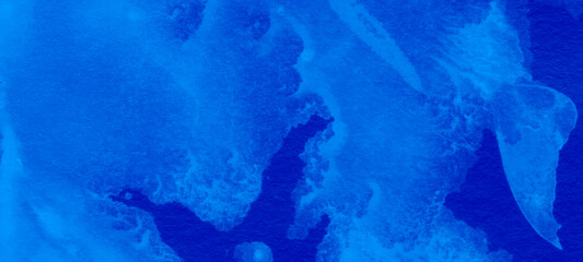 Deep blue watercolor textures and abstract washes with high contrast and fluid dynamics, creating an intense artistic background for impactful design, vibrant art, and striking visuals. © Nusrat
