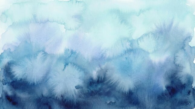 Abstract blue watercolor texture background featuring soft gradient washes and artistic bleeding pigments