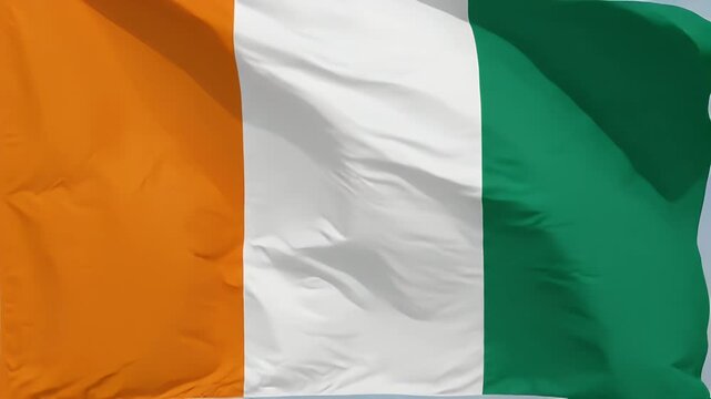 The video showcases the national flag of Ivory Coast, featuring three vertical stripes of orange, white, and green.