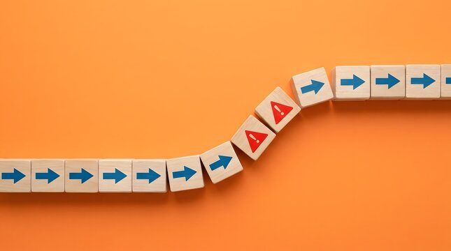 Risk management and crisis warning concept with wooden domino blocks turning corner on orange background, business challenge, change, and disruption