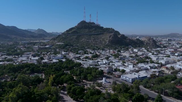 Aerial view of Hermosillo city in Sonora Mexico featuring the iconic Cerro de la Campana hill with communication antennas.