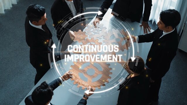 Business Team Collaboration and Strategy Meeting on Continuous Improvement with Gears and Vision in Modern Office Setting Sigmoid
