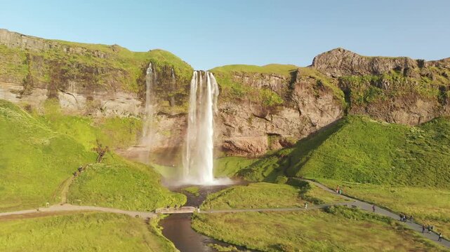 Seljaland Waterfall, aka Seljalandsfoss, panoramic aerial view on a sunny summer day, Iceland