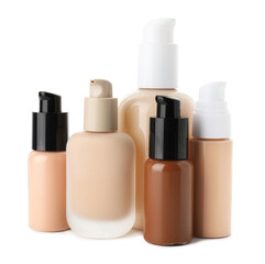 Bottles of skin foundations in different shades isolated on white © New Africa